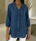 Davellia | Flowing Denim Blouse with V-Neck and Ruffle Detail
