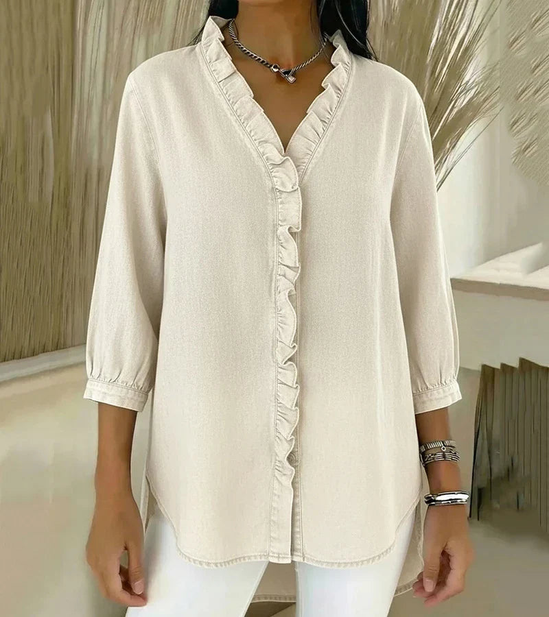 Davellia | Flowing Denim Blouse with V-Neck and Ruffle Detail