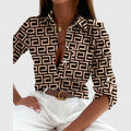 Davellia | Elegant Geometric Print V-Neck Blouse